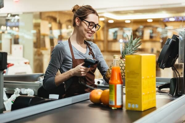 Retail employee scanning items